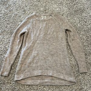 Abercrombie women’s tan knitted sweater with zipper on side collar.